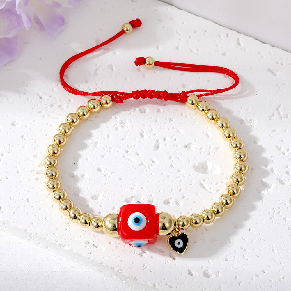 Brazalete de oro real colgante de cobre chapado en color de ojo de diablo al por mayor